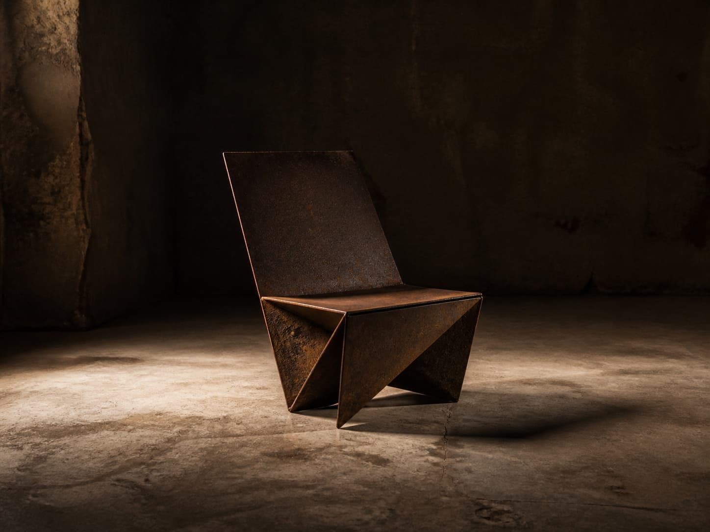 Oxidized fictional chair prototype under directional light.