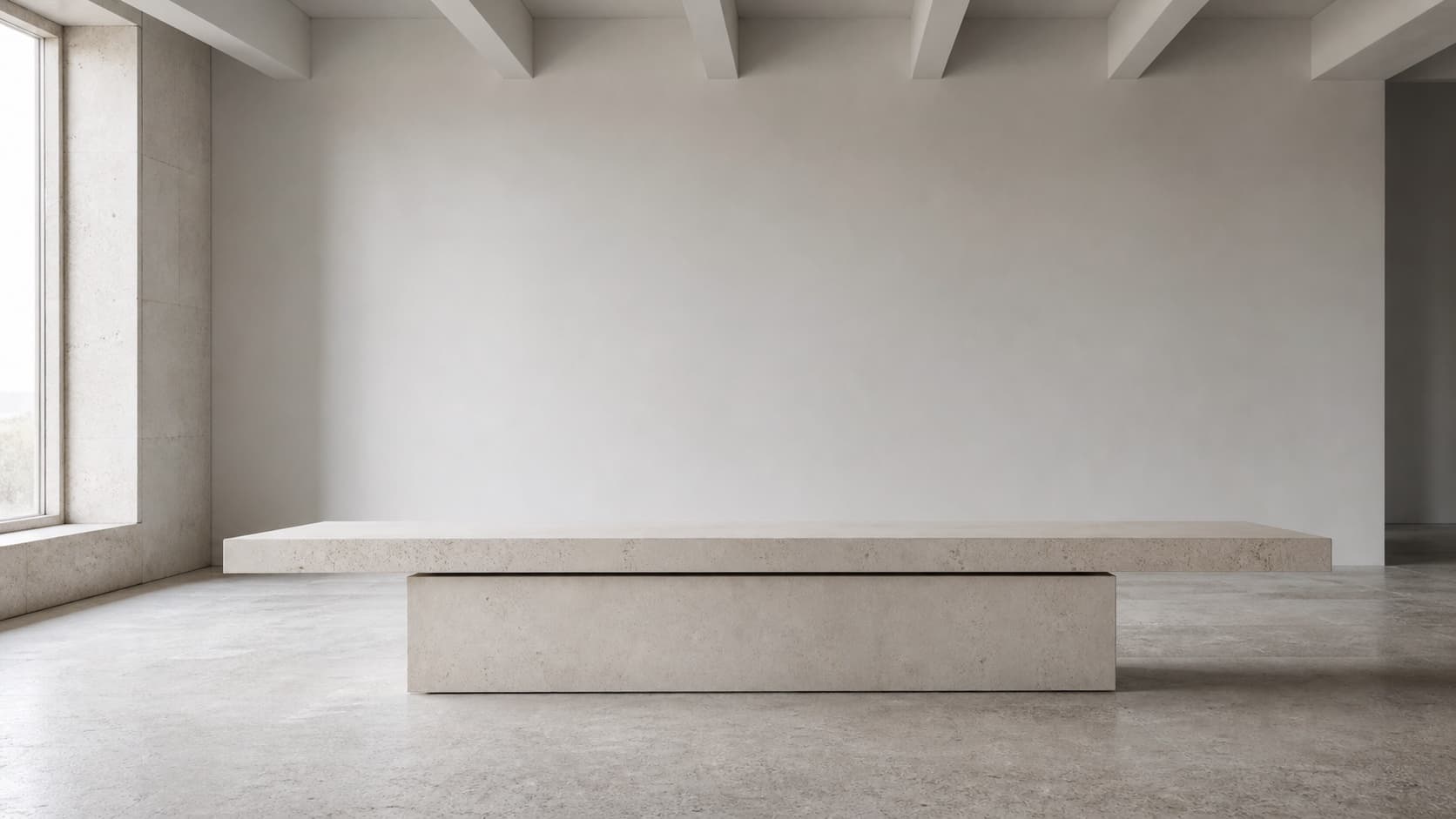 Fictional pale stone table prototype in a quiet architectural room.